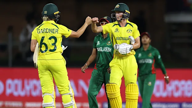 Ashleigh Gardner and Meg Lanning of Australia celebrate following the ICC Women's T20 World Cup group A match between Australia and Bangladesh at St George's Park on February 14, 2023 in Gqeberha, South Africa.