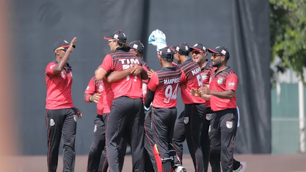 Singapore celebrate the win against Scotland.