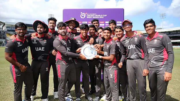 Players of United Arab Emirates celebrate with the Plate Trophy following the ICC U19 Men's Cricket World Cup Plate Final match between United Arab Emirates and Ireland at Queen's Park Oval on January 31, 2022 in Port of Spain, Trinidad And Tobago.