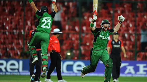 61023 Ireland cricketers Trent Johnston (L) an