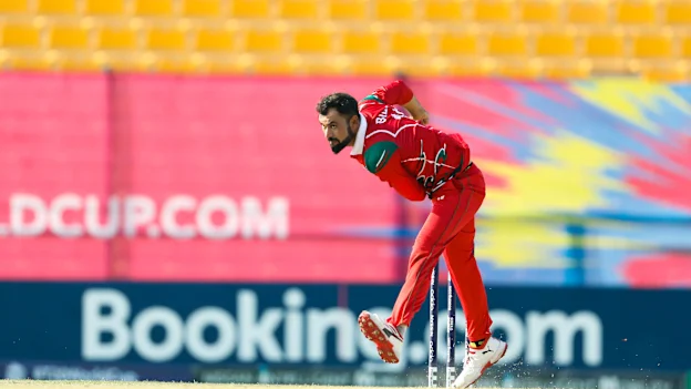 Bilal Khan bowling against Hong Kong.