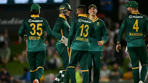 South Africa's bowler Prenelan Subrayen (C) celebrates his wicket of Australia's Travis Head with teammates during the first one-day international (ODI) cricket match between Australia and South Africa