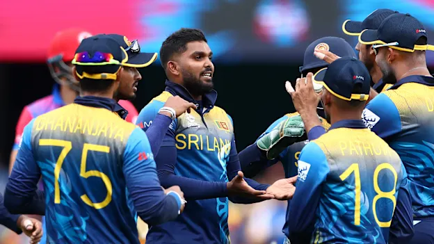 Wanindu Hasaranga of Sri Lanka celebrates after taking the wicket of Usman Ghani of Afghanistan during the ICC Men's T20 World Cup match between Afghanistan and Sri Lanka