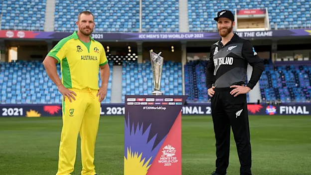 Rival captains Aaron Finch of Australia and Kane Williamson of New Zealand pose with the T20 World Cup Trophy