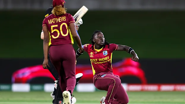 Deandra Dottin of the West Indies celebrates after taking the wicket of Katey Martin of New Zealand during the 2022 ICC Women's Cricket World Cup match between New Zealand and the West Indies at Bay Oval on March 04, 2022 in Tauranga, New Zealand.