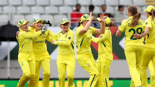 Australia celebrate the wicket of Smriti Mandhana of India during the 2022 ICC Women's Cricket World Cup match between India and Australia at Eden Park on March 19, 2022 in Auckland, New Zealand.