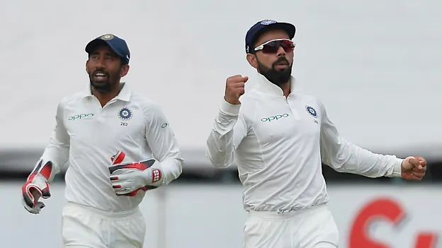 Wriddihiman Saha and Virat Kohli