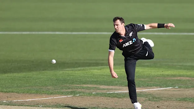 Matt Henry of New Zealand fields the ball during game three of the One Day International series between New Zealand and Sri Lanka at Seddon Park on March 31, 2023 in Hamilton, New Zealand.