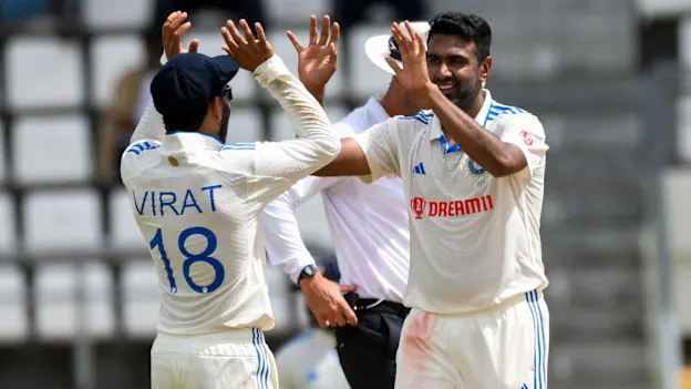 Ashwin-high-five