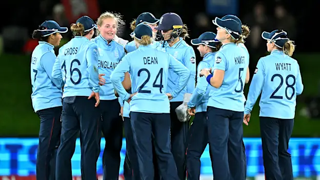 Sophie Ecclestone of England is congratulated by team mates after taking her fifth wicket during the 2022 ICC Women's Cricket World Cup Semi Final match between South Africa and England at Hagley Oval on March 31, 2022 in Christchurch, New Zealand.
