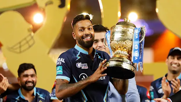 hardik with trophy