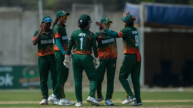 Bangladesh players celebrate wicket of Qiana Joseph