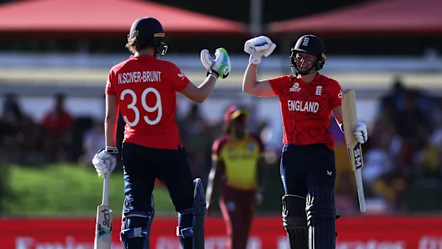 Heather Knight and Nat Sciver-Brunt of England celebrate following the ICC Women's T20 World Cup group B match between West Indies and England at Boland Park on February 11, 2023 in Paarl, South Africa.