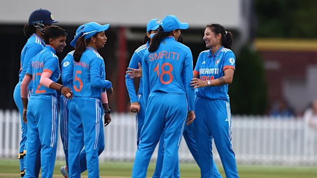 Renuka Singh celebrates a wicket with the team
