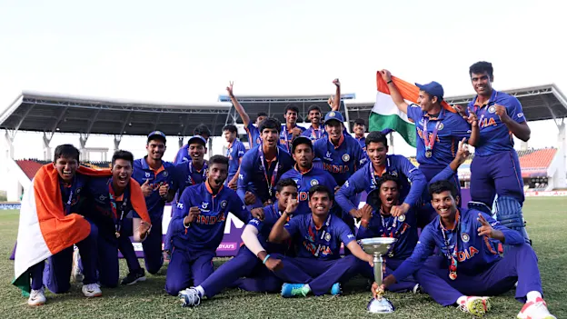 Players of India celebrate with the ICC U19 Men's World Cup Trophy following the ICC U19 Men's Cricket World Cup Final match between England and India at Sir Vivian Richards Stadium on February 05, 2022 in Antigua, Antigua and Barbuda.