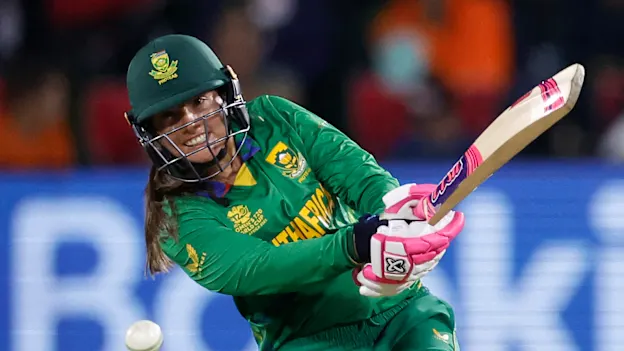 South Africa's Sune Luus watches the ball after playing a shot during the Group A T20 women's World Cup cricket match between South Africa and Australia at St George's Park in Gqeberha on February 18, 2023.