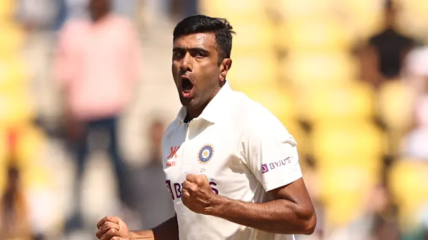 Ravichandran Ashwin of India celebrates taking the wicket of David Warner of Australia 1920x1080