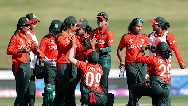 Bangladesh celebrate the wicket of Nida Dar of Pakistan during the 2022 ICC Women's Cricket World Cup match between Pakistan and Bangladesh at Seddon Park on March 14, 2022 in Hamilton, New Zealand.