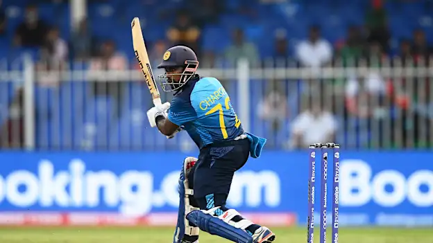 Charith Asalanka of Sri Lanka plays a shot during the ICC Men's T20 World Cup match between Sri Lanka and Bangladesh at Sharjah Cricket Stadium on October 24, 2021 in Sharjah, United Arab Emirates.