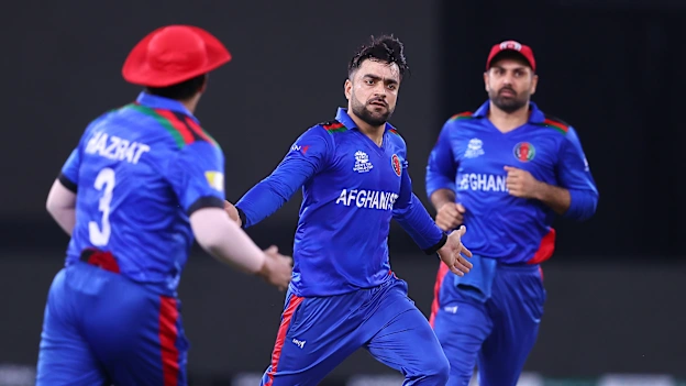 Rashid Khan of Afghanistan celebrates the wicket of Babar Azam of Pakistan during the ICC Men's T20 World Cup match between Pakistan and Afghanistan 1920x1080