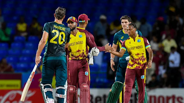Shai Hope congratulates Aaron Hardie after the final T20I