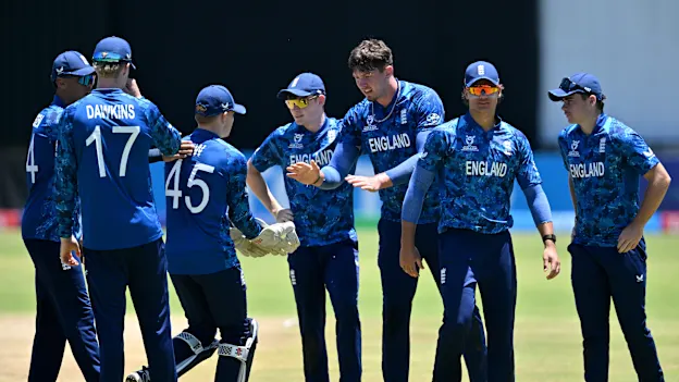 Alex Green of England celebrates with teammates after taking the wicket of Samiun Basir Ratul of Bangladesh during the ICC U19 Men's Cricket World Cup 2026 Super Six match