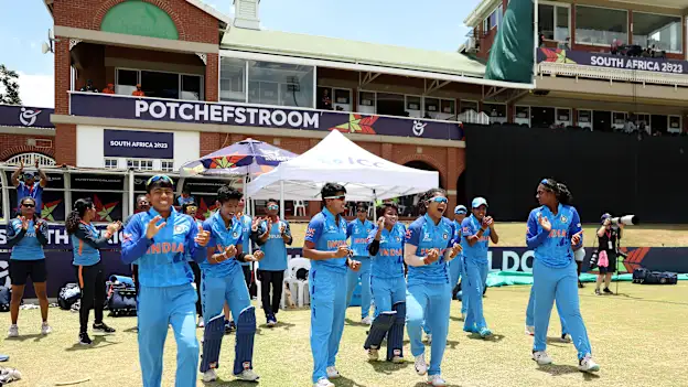 Players of India celebrate on the bench as India defeat New Zealand during the ICC Women's U19 T20 World Cup 2023 Semi Final match between India and New Zealand at JB Marks Oval on January 27, 2023 in Potchefstroom, South Africa.