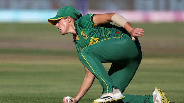 Tazmin Brits of South Africa takes a catch to dismiss Danni Wyatt of England during the ICC Women's T20 World Cup Semi Final match between England and South Africa at Newlands Stadium on February 24, 2023 in Cape Town, South Africa.