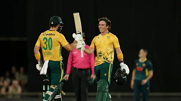 Dewald Brevis celebrates after his century