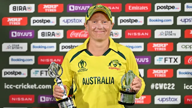 Alyssa Healy of Australia poses with the Player of the Match and Tournament award after the 2022 ICC Women's Cricket World Cup Final match between Australia and England at Hagley Oval on April 03, 2022 in Christchurch, New Zealand.