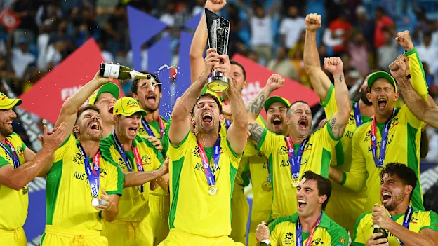 Mitchell Marsh of Australia lifts the ICC Men's T20 World Cup Trophy following during the ICC Men's T20 World Cup final match between New Zealand and Australia at Dubai International Stadium on November 14, 2021 in Dubai, United Arab Emirates.
