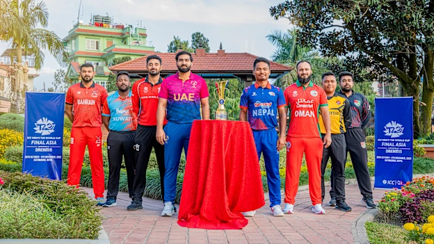 The eight captains with the trophy ahead of the ICC Men’s T20 World Cup Asia Qualifier Final in Nepal.
