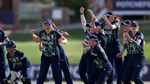 Players of England celebrate after Milly Illingworth of Australia is dismissed.