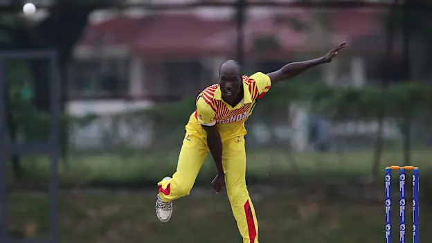 Frank Nsubuga of Uganda bowls during a WCL Division 4 match against Denmark