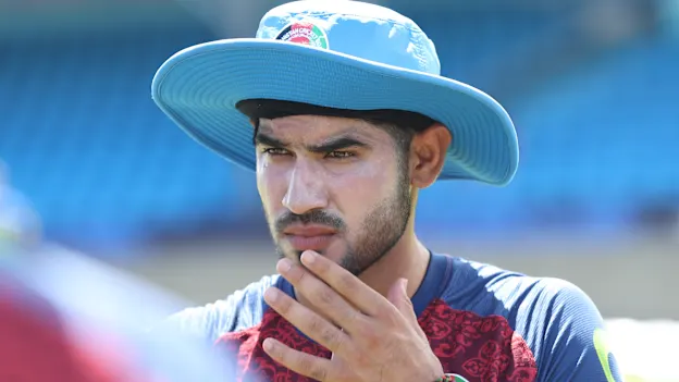 Mohammad Ishaq of Afghanistan listen to instructions during a net session as part of the ICC Men's T20 Cricket World Cup West Indies & USA 2024 at Arnos Vale Ground on June 23, 2024 in St Vincent, Saint Vincent and The Grenadines