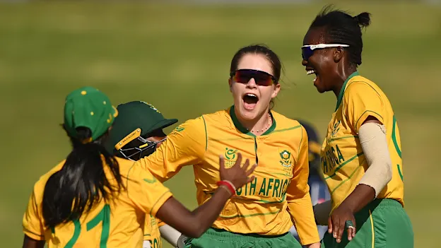 Madison Landsman of South Africa celebrates after taking the wicket of Orla Montgomery.
