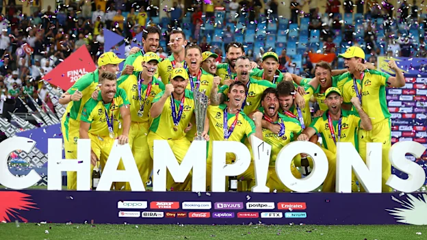 Aaron Finch of Australia lifts the ICC Men's T20 World Cup Trophy following the ICC Men's T20 World Cup final match between New Zealand and Australia at Dubai International Stadium on November 14, 2021 in Dubai, United Arab Emirates.