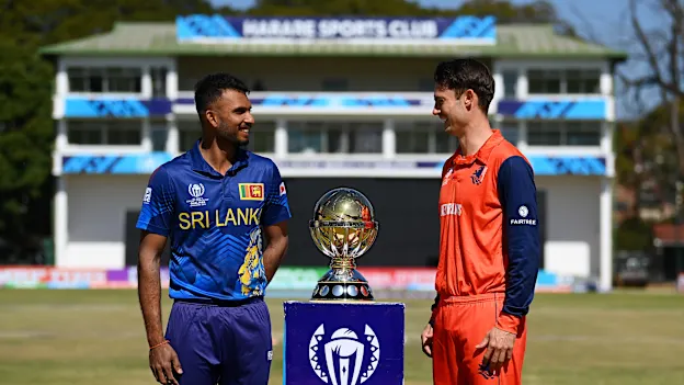 Dasun Shanaka of Sri Lanka and Scott Edwards of Netherlands pose for a photo with the ICC Men's Cricket World Cup Qualifier Trophy at Harare Sports Club on July 08, 2023 in Harare, Zimbabwe.