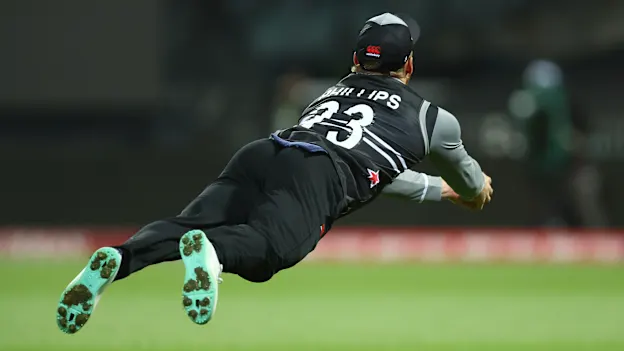 Glenn Phillips of New Zealand catches out Marcus Stoinis of Australia during the ICC Men's T20 World Cup match between Australia and New Zealand