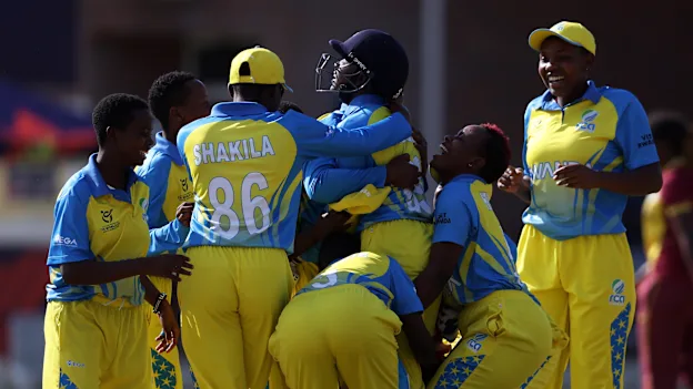Players of Rwanda celebrate following the ICC Women's U19 T20 World Cup 2023 Super 6 match between West Indies and Rwanda