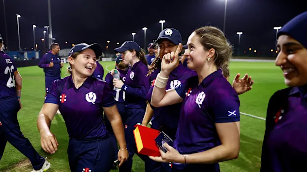 Rachel Slater of Scotland celebrates with teammates after being award the Player of the Match award after the ICC Women's T20 World Cup Qualifier 2024 match between Scotland and Uganda at Tolerance Oval on April 25, 2024 in Abu Dhabi, United Arab Emirates.