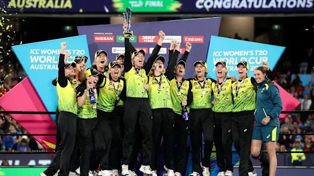 Meg Lanning of Australia holds aloft the championship trophy and celebrates with team mates after winning the ICC Women's T20 Cricket World Cup Final match between India and Australia at the Melbourne Cricket Ground on March 08, 2020.
