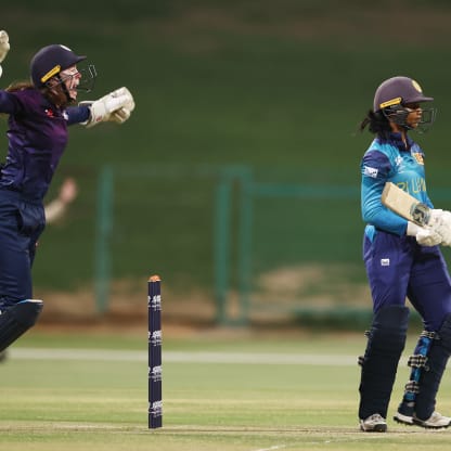 Sarah Bryce of Scotland celebrates after taking a catch for the wicket of Vishmi Gunaratne of Sri Lanka during the ICC Women's T20 World Cup Qualifier 2024 Final match between Scotland and Sri Lanka at Zayed Cricket Stadium on May 07, 2024 in Abu Dhabi, United Arab Emirates.