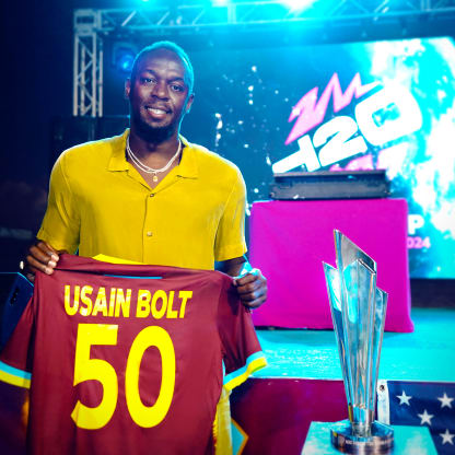 Usain Bolt with the ICC Men's T20 World Cup trophy