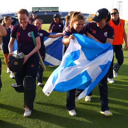 Players of Scotland celebrate victory following the ICC Women's T20 World Cup Qualifier 2024 Semi-Final match between Ireland and Scotland at Zayed Cricket Stadium on May 05, 2024 in Abu Dhabi, United Arab Emirates.