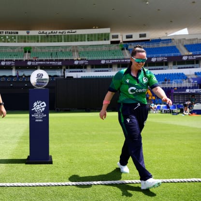 Captains Laura Delany of Ireland and Kathryn Bryce of Scotland walk out prior to the ICC Women's T20 World Cup Qualifier 2024 Semi-Final match between Ireland and Scotland at Zayed Cricket Stadium on May 05, 2024 in Abu Dhabi, United Arab Emirates.