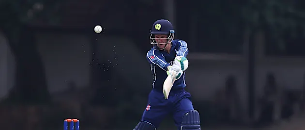 Angus Guy of Scotland edges the ball towards the boundary during the ICC U19 Cricket World Cup warm up match between Scotland and Japan at St John's College on January 13, 2020 in Johannesburg, South Africa.