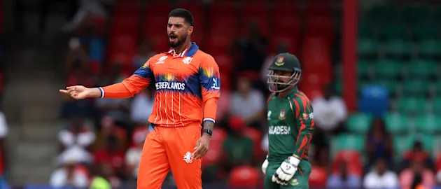 Aryan Dutt celebrates after taking wicket of Litton Das