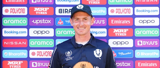 Brandon McMullen of Scotland poses for a photo with the Player of the Match award following the ICC Men's Cricket World Cup Qualifier Zimbabwe 2023 match between the Scotland and Oman at Bulawayo Athletic Club on June 25, 2023 in Bulawayo, Zimbabwe.