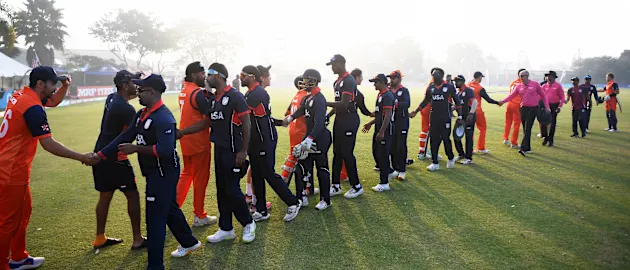 Players of USA and the Netherlands shake hands following the ICC Men's Cricket World Cup Qualifier Zimbabwe 2023 match between the Netherlands and USA at Takashinga Cricket Club on June 22, 2023 in Harare, Zimbabwe.